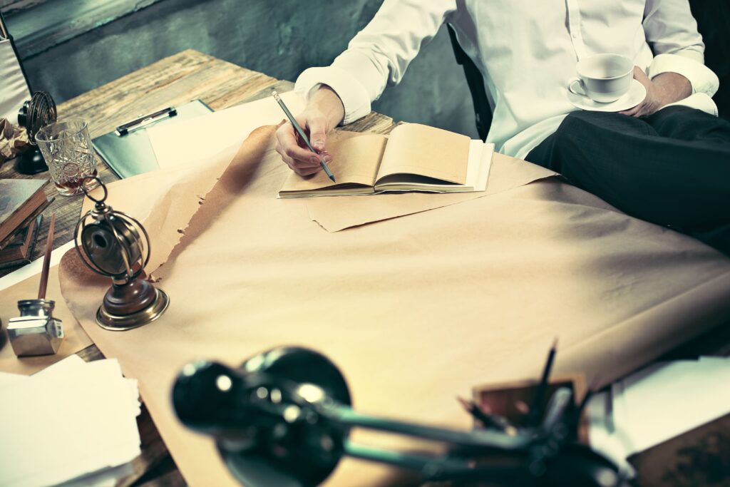 architect-working-drawing-table-office